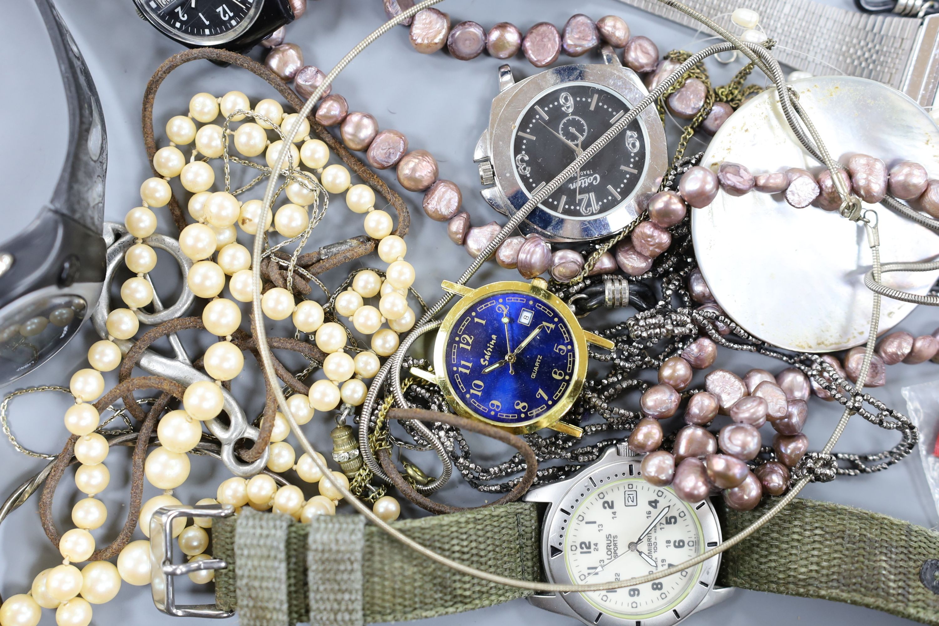 A small quantity of modern minor wrist watches and assorted costume jewellery.